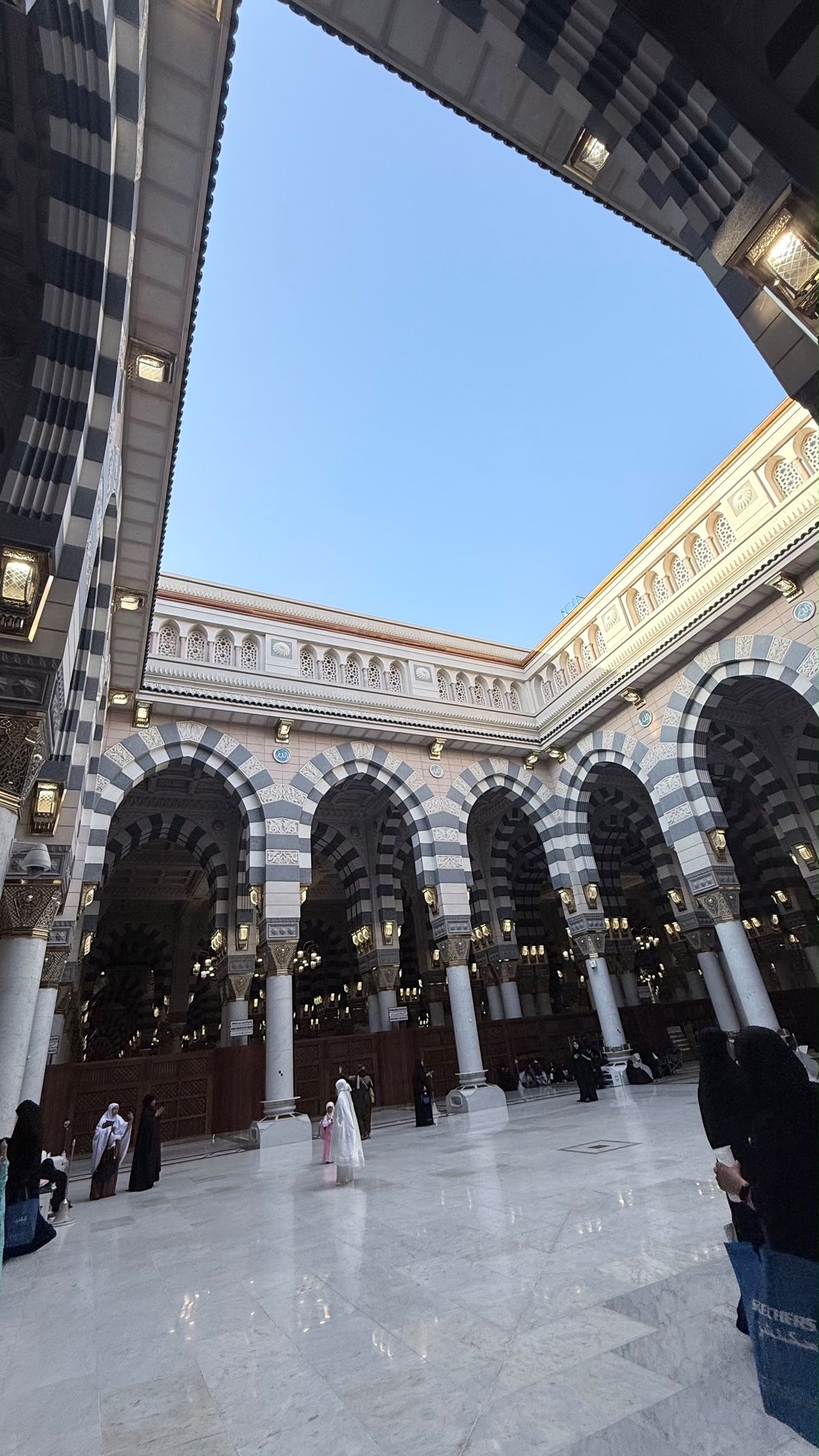 Arched walkways around the courtyard of the Prophet's Mosque