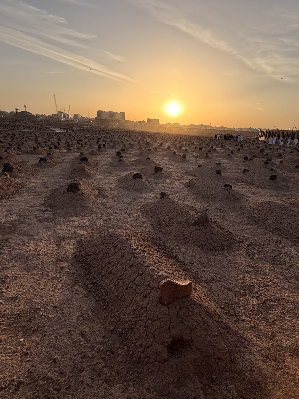 Sunset over Jannat al-Baqi cemetery in Madinah